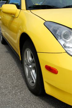 Yellow sports car, front view