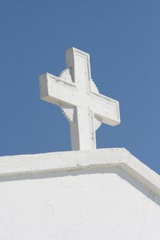 white cross detail from profitis helias church dome athens greece