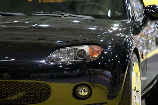 black sprort car front detail for background use