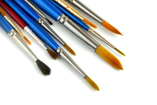 Paintbrushes on white background 
