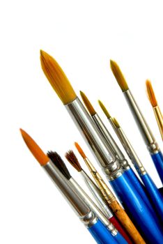 Paintbrushes on white background