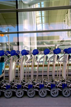 Luggage carts at modern international airport