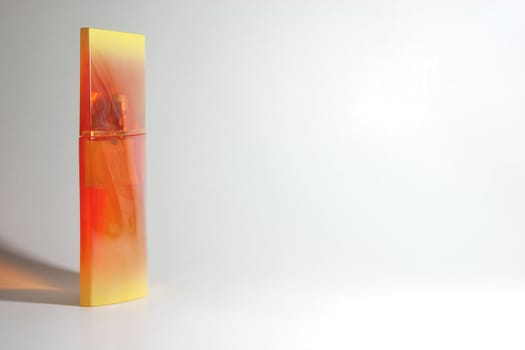 designed orange yellow perfume bottle