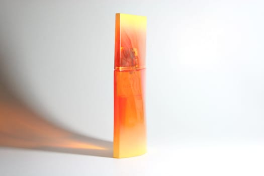 designed orange yellow perfume bottle midle shut
