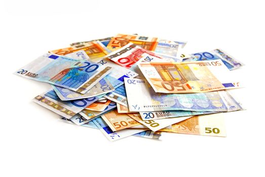 Pile of european currency bills isolated on white background
