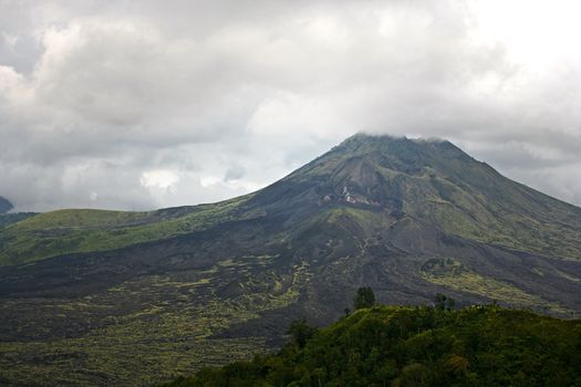 Sleeping volcano on a background of the sky. Indonesia. Bali