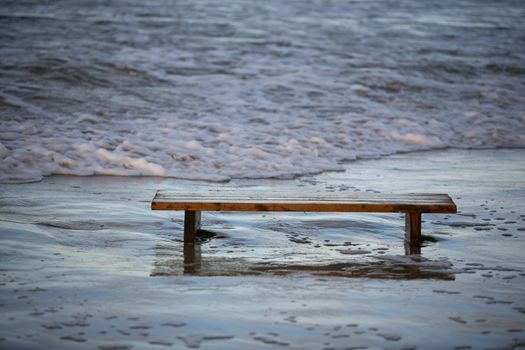  Wooden bench worth in the sea