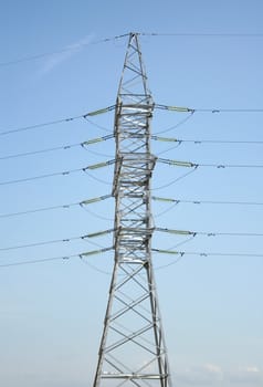 new electricity pylon on a background blue sky