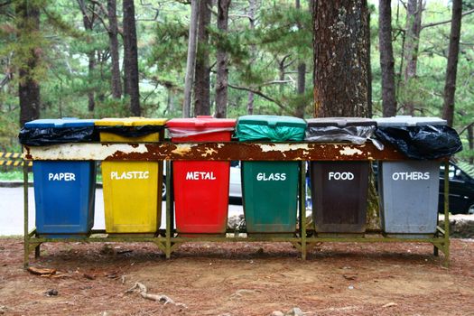 color coded trash bins for waste segregation
