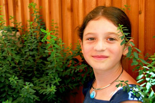 Portrait of a young girl wearing a necklace