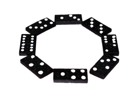 A circle of dominoes tiles on a white background