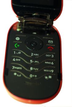 A photograph of a generic 'flip' cellphone