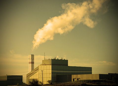 Waste to Energy Plant with Smoke Coming Out of a Smokestack