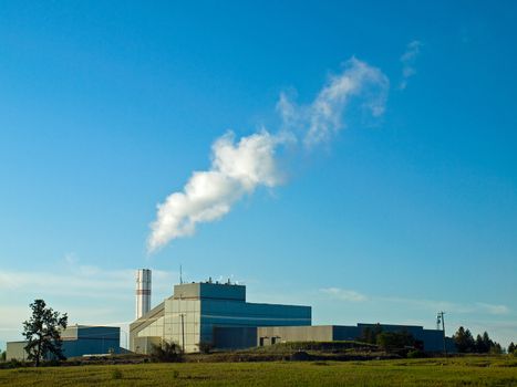 Waste to Energy Plant with Smoke Coming Out of a Smokestack