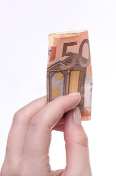 Hand holding 50 Euro bill, studio isolated on white