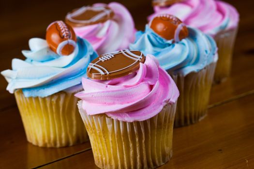 Close up of a cup cake on the wooden table