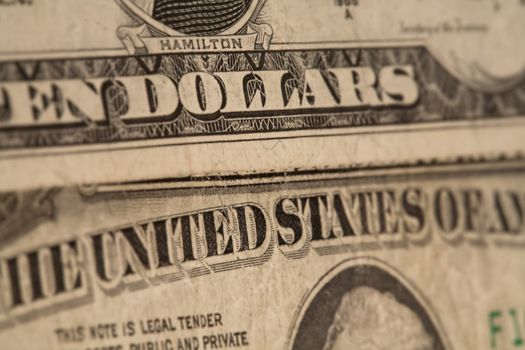 Money background - US dollars background, reto style toned photo with shallow DOF