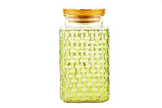 Green mozaic glass container over white background