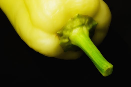 Yellow sweet pepper studio  isolated on black background