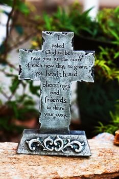 Close up decor of outdoors stone made cross