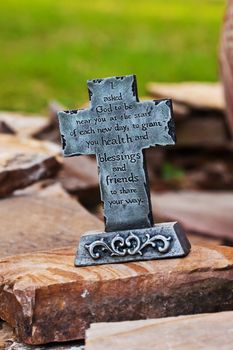 Close up decor of outdoors stone made cross