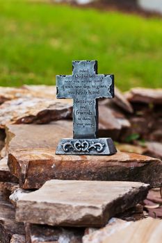 Close up decor of outdoors stone made cross