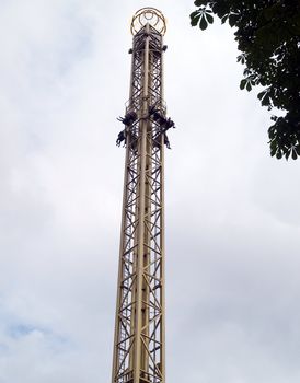 Free fall tower ride in Tivoli Gardens amusement park Copenhagen Denmark