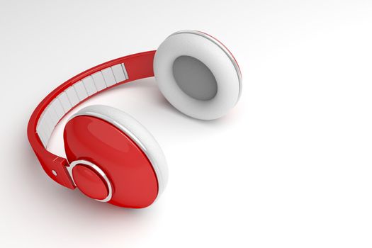 Red headphones on gray background with copy space on right