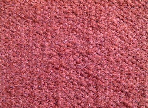 Qualitative red fabric texture. Abstract background. Close up.