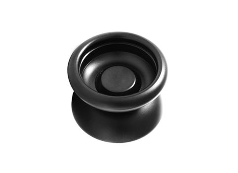 Black yo-yo toy on a white background