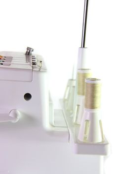 sewing machine type of home on white isolated