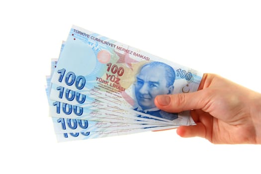 woman holding turkish lira on isolated white background