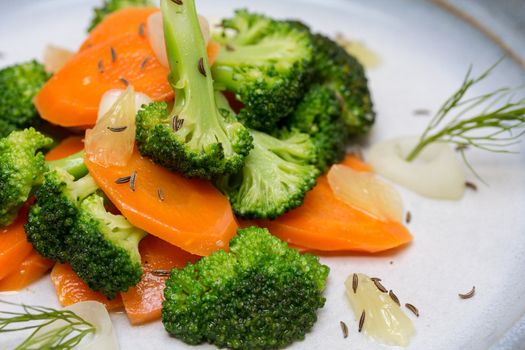 Broccoli carrot salad with rosemary and vinaigrette