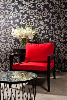 Black red Chair furniture with elegant wall decoration
