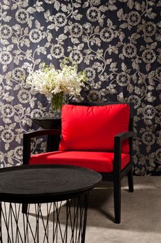 Black red Chair furniture with elegant wall decoration
