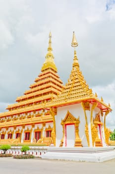 Golden pagoda at the Thai temple,
Buddha church at the Thai temple style
