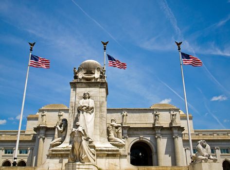 Union Station at Washington DC with Three American Flags