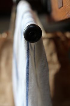 dish cloth hanging in an old vintage kitchen with a shallow depth of field 