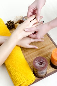 Hands massage in the spa salon