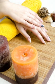 Spa hands over bamboo mat