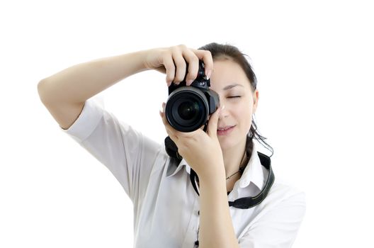 young brunette girl with photocamera isolated on white