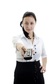 Woman holding remote control isolated on white background, focused on remote control
