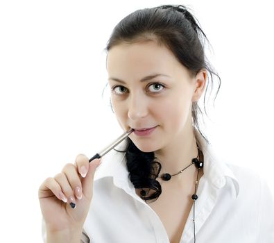 Business woman with a pen near the mouth isolated on white background