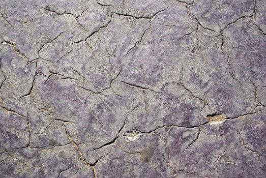 Old red damaged sidewalk. Good as background or backdrop.