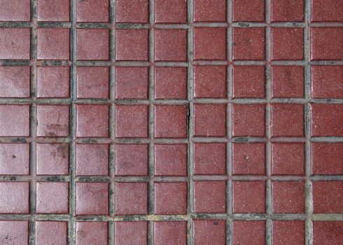 Old red tiled floor. Good as backdrop or background.