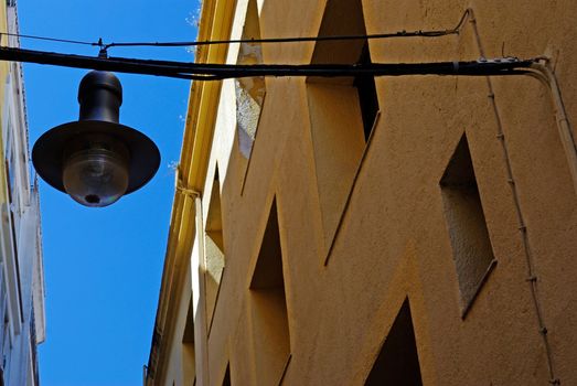 Typical architecture and street light of Lloret de Mar. Costa Brava, Spain.