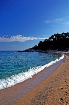 Seascape of Lloret de Mar beach before sunset. Costa Brava, Spain.