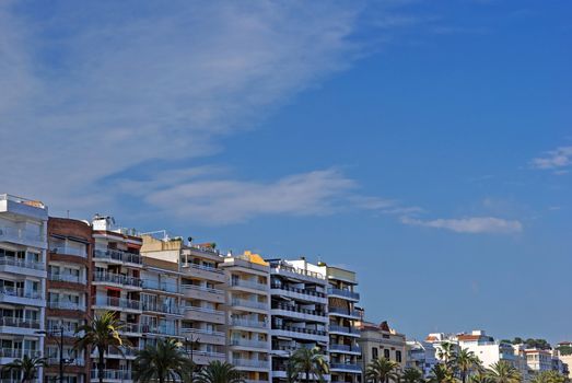 Cityscape of Lloret de Mar, Spain. Hotel and residence buildings by the sea.