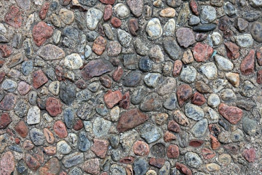 Textured pebble sidewalk background.