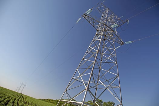 High voltage tower in the field.